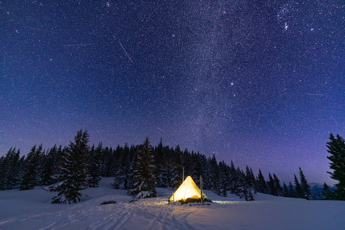 Snow Camping under a starry sky